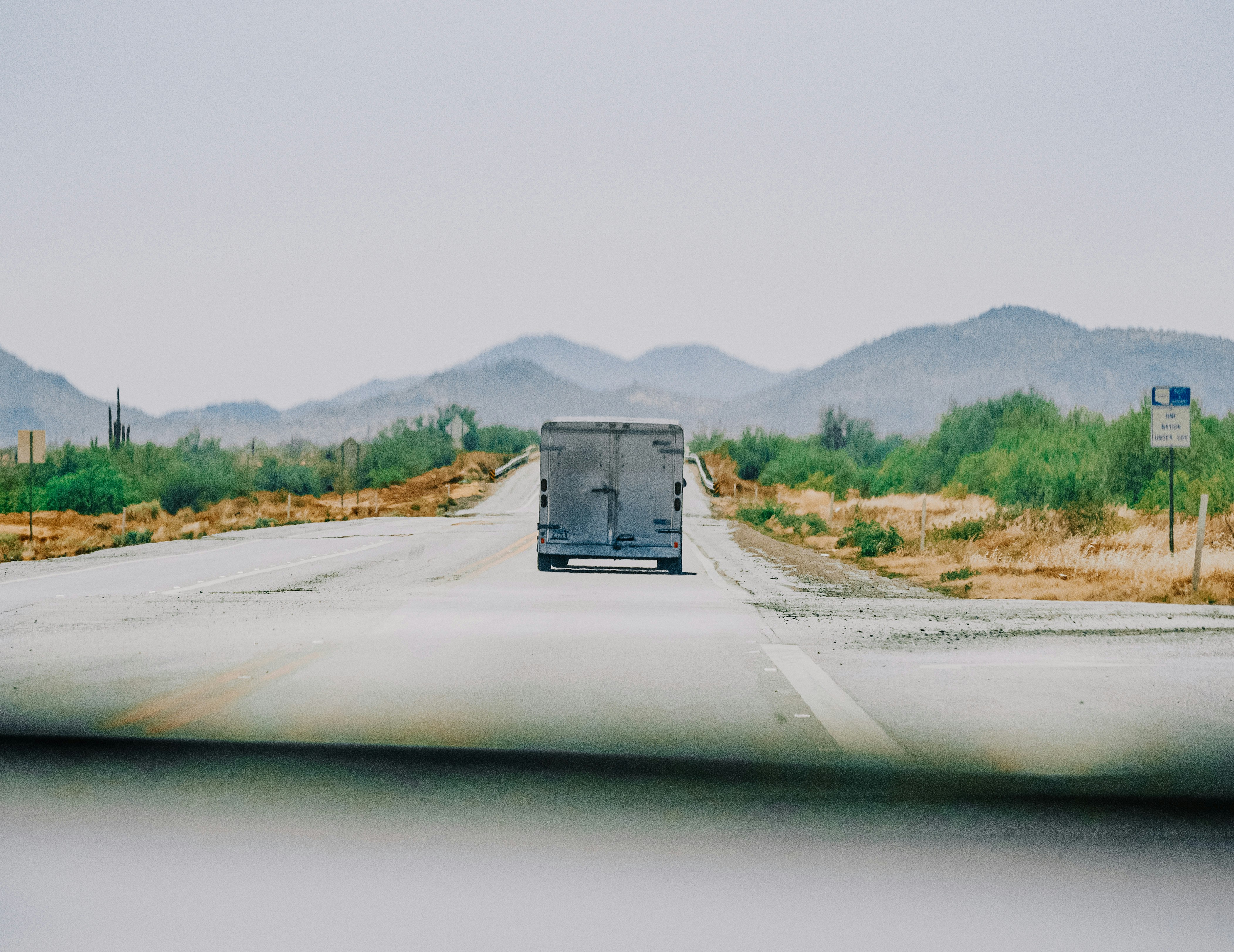 gray concrete road during daytime